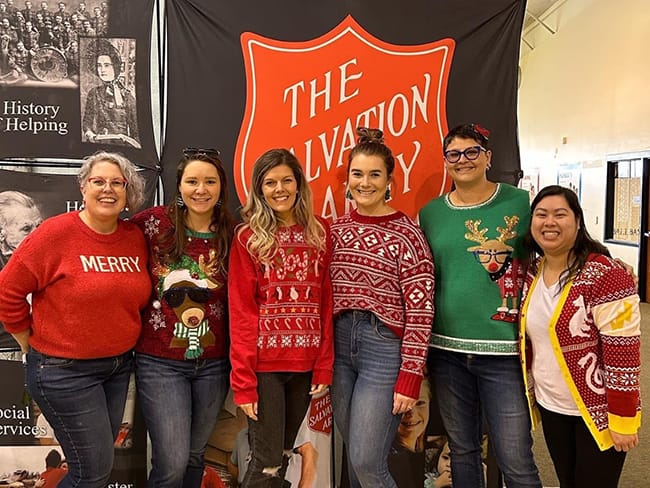 As pictured, some of our staff last Christmas 2022 helping Wichita Salvation Army distribute toys to children in need.
